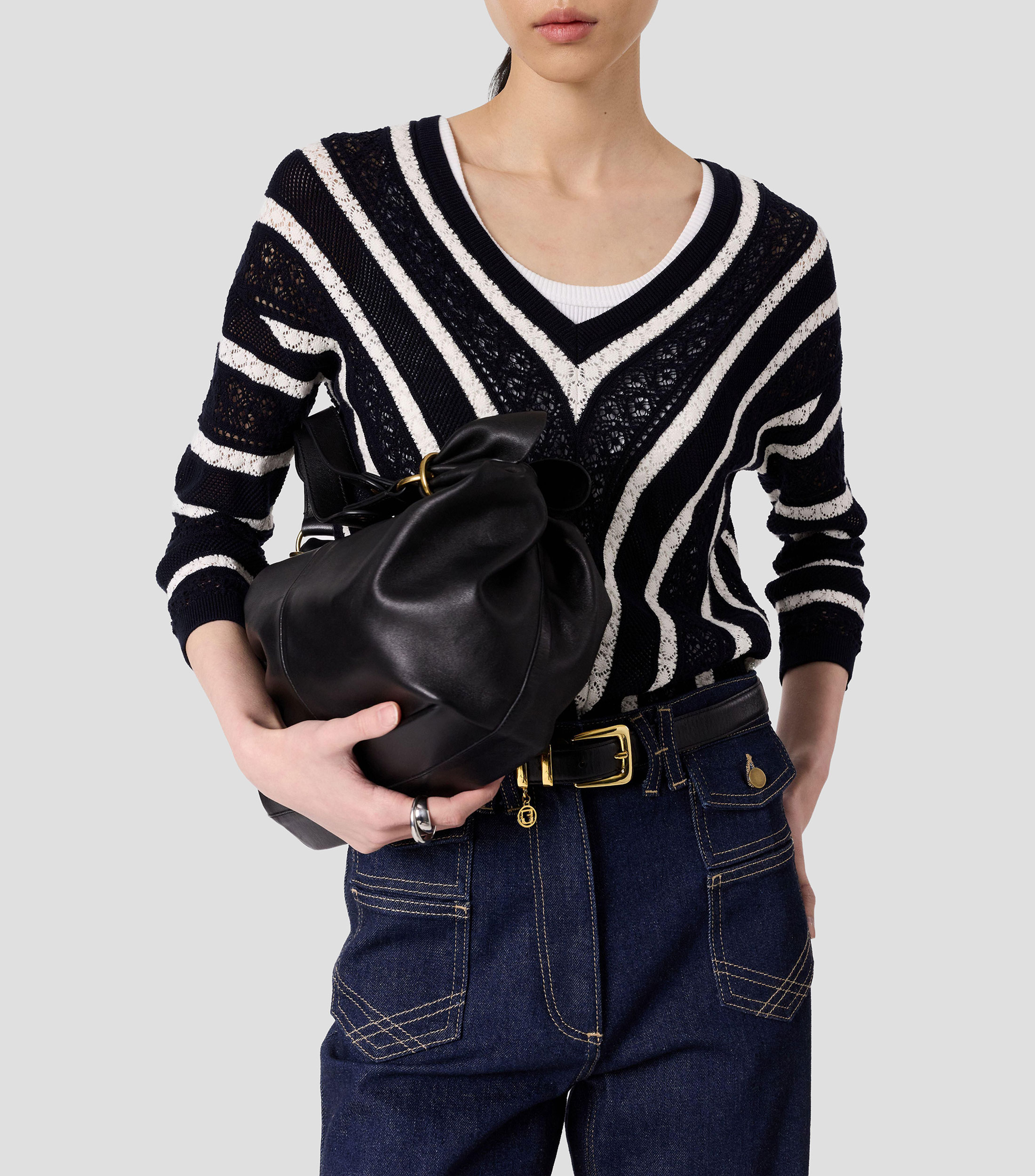Suéter cuello V mujer